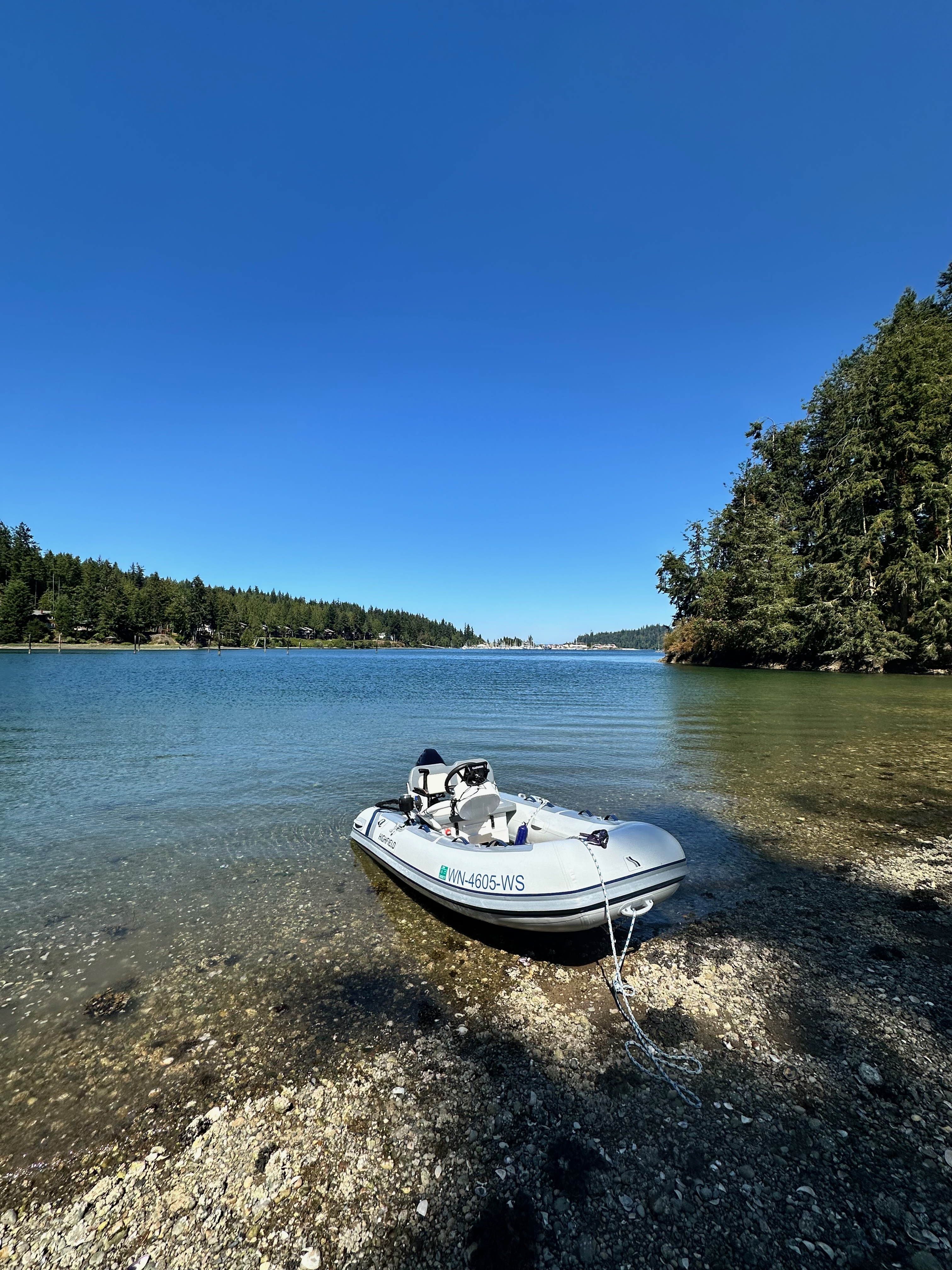Oceanus dinghy pulled onto the beach at Port Ludlow