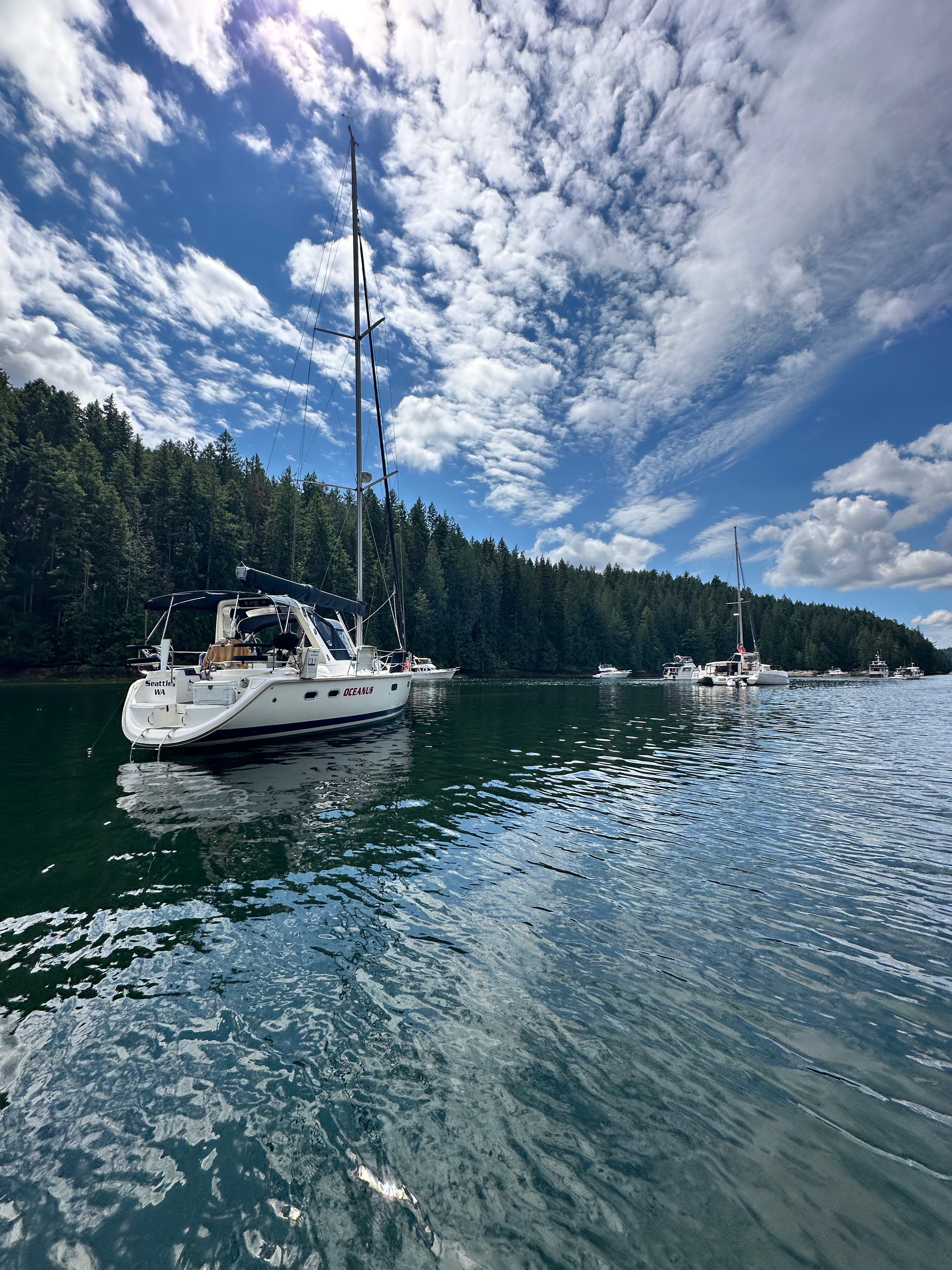 Oceanus and neighboring boats in Melanie Cove
