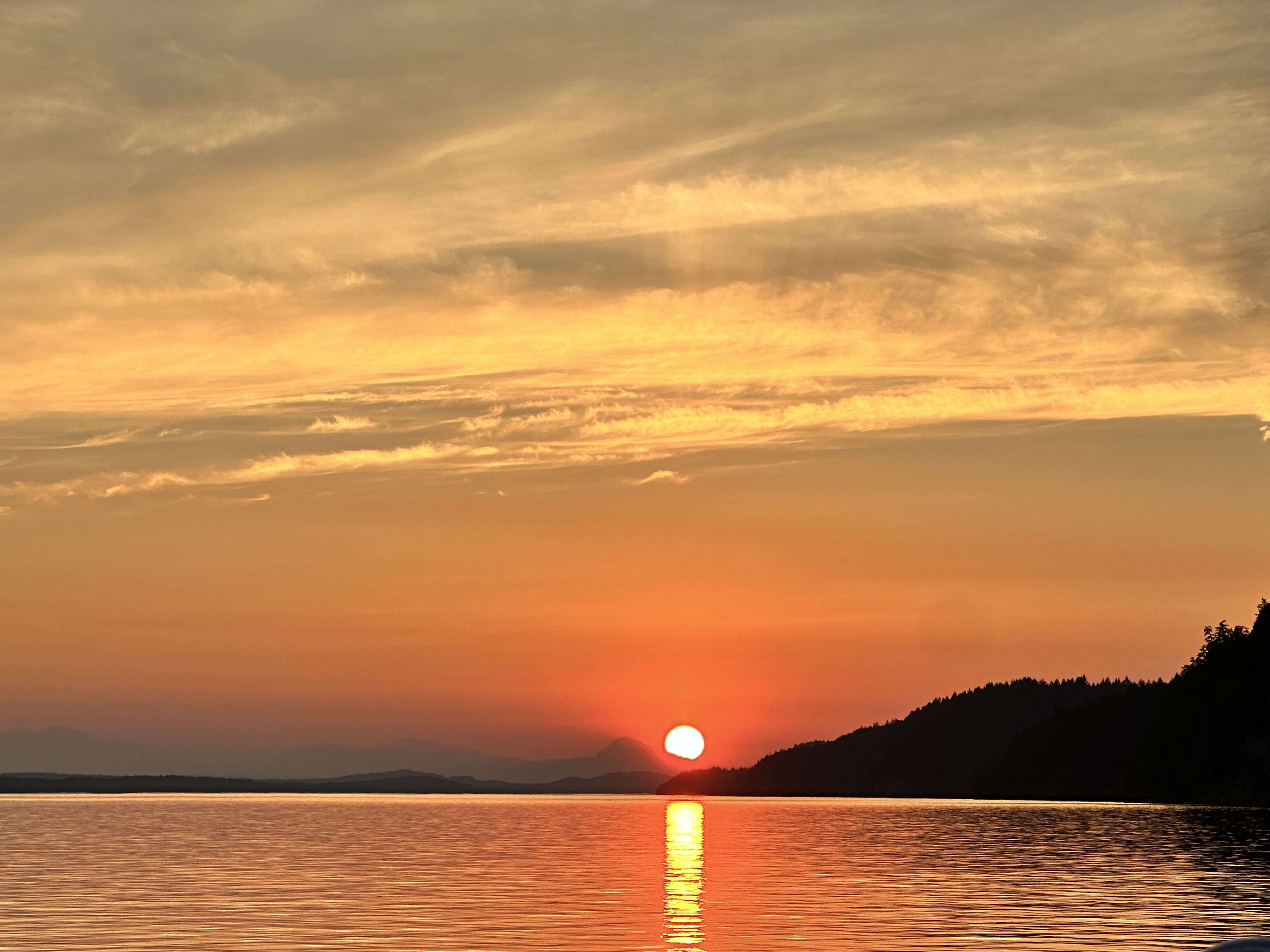 Orange sunset over the water at Montague Harbour North