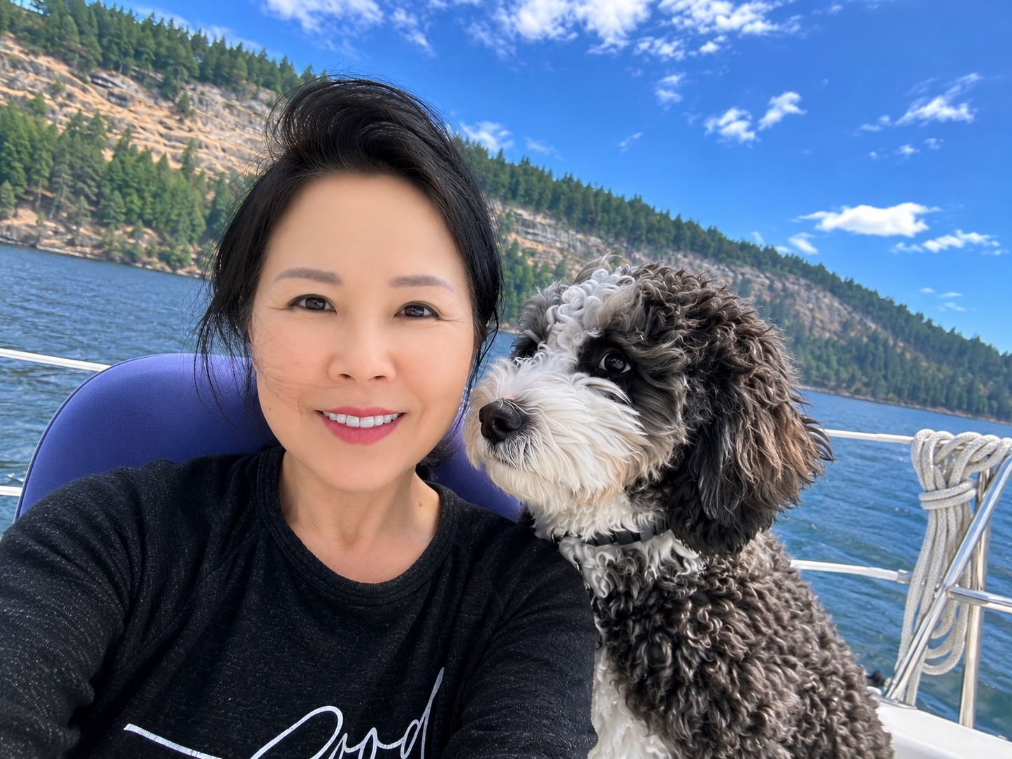 Yinglan and Shadow together with the forested shoreline behind them