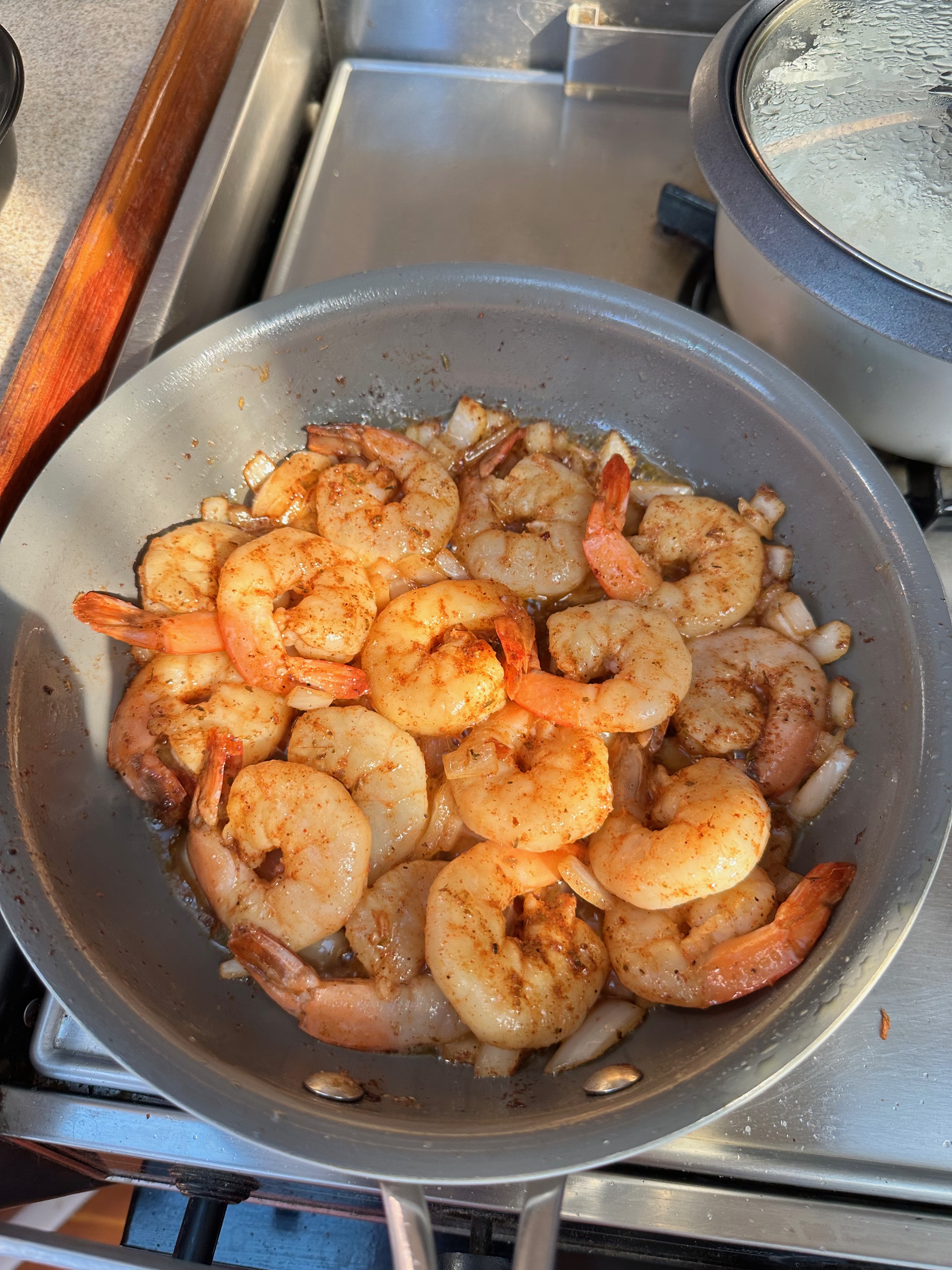 Shrimp cooking aboard Oceanus at Roche Harbor